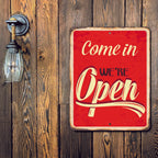 PLACA COME IN WE RE OPEN